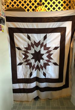 Hand quilted needs backing or quilting mostly brown