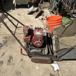 Briggs & Stratton 3 hp front loader antique lawnmower still runs good