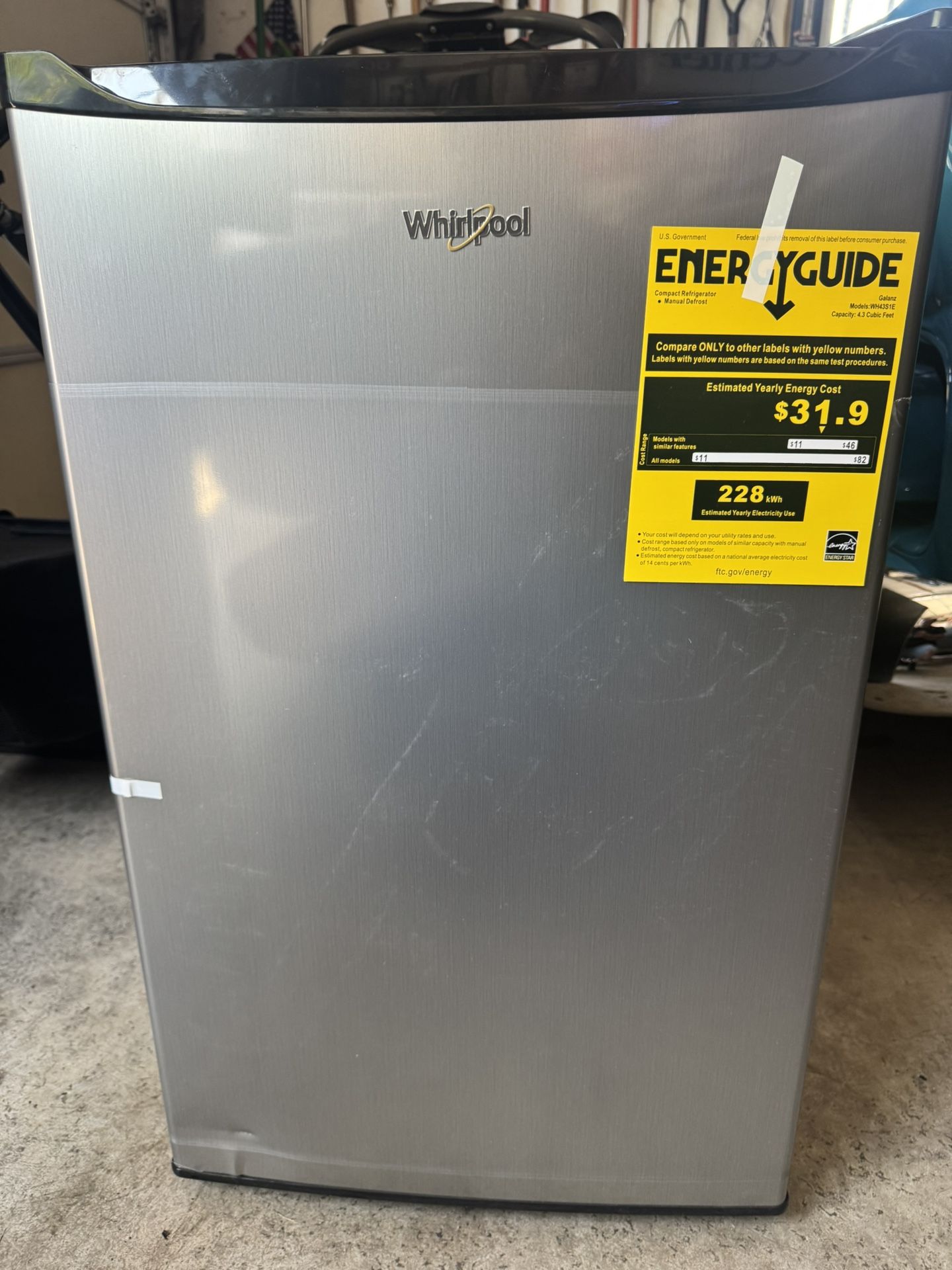 New Whirlpool 4.3 Cu. Ft. Refrigerator Minor Bottom Door Damage. Works Good. Must Pickup