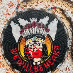 Hand beaded “We Will Be Heard” medallion