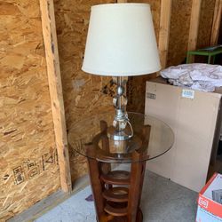 End/side Table With Lamp -  Table Is 25 Inches High -  Glass Is 24 Inches Wide -  Lamp Is 26 Inches High