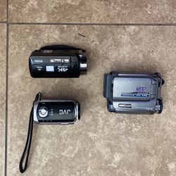Three Digital Video Cameras, One Jvc 800 X One Gz-mc200u And One Dvc 4K Ultra Hd Wi-Fi Touchscreen Digital Camera