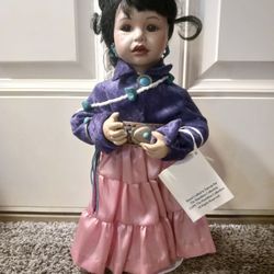 Porcelain Native American Doll