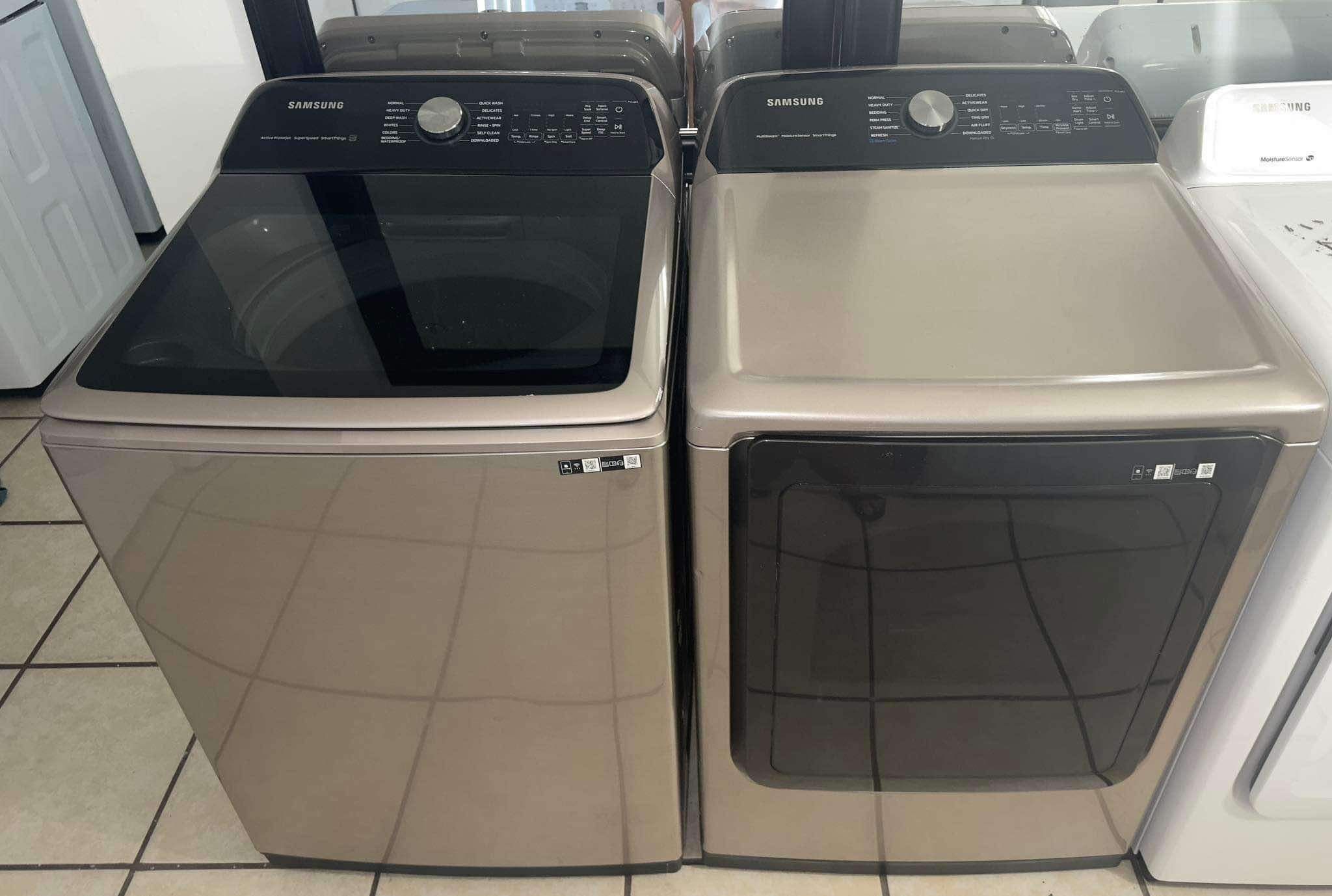 Samsung gold and black top load extra capacity washer and dryer set
