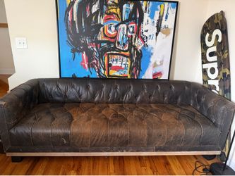 Tufted vintage leather sofa