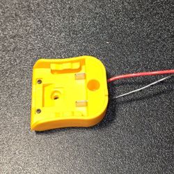 "Dew Yellow" 12 volt li-ion battery Adapter.   Requires "Dew Yellow" 12v Battery