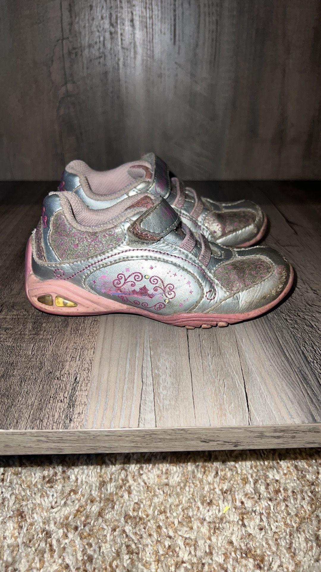 Stride Rite | Pink Sleeping Beauty Light-Up Sneaker - Girls size 7.5m. These are very worn. Traction is still pretty good except heels. Toes are scuff