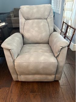 Electric recliner with built in massager