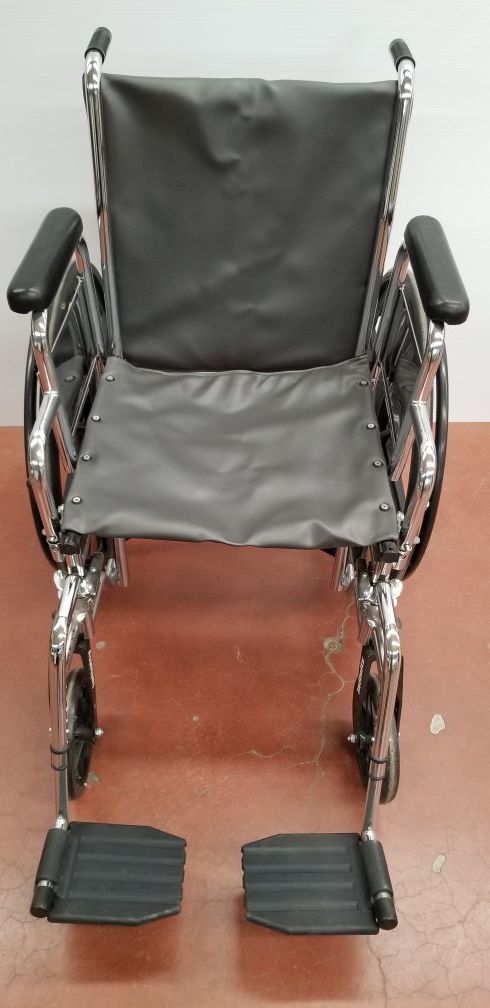 Wheelchair with new upholstery, swing away leg rests