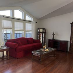 RED COUCH FOR SALE ,  WALL ROD IRON AND TV STAND