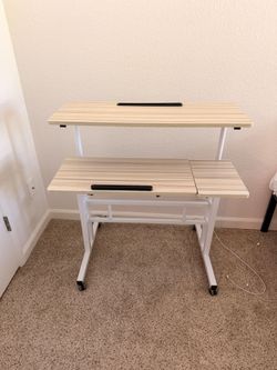 Standing desk adjustable