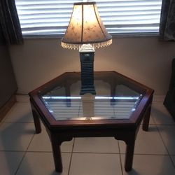 Table and Lamp has a Small. light inside as You Can See in. the Photo 43x43 height 17