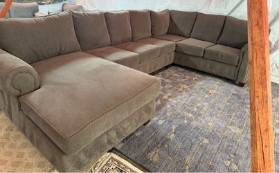 Grey couch seven seater great condition has beads around it. We sell all the time delivery $40 local.