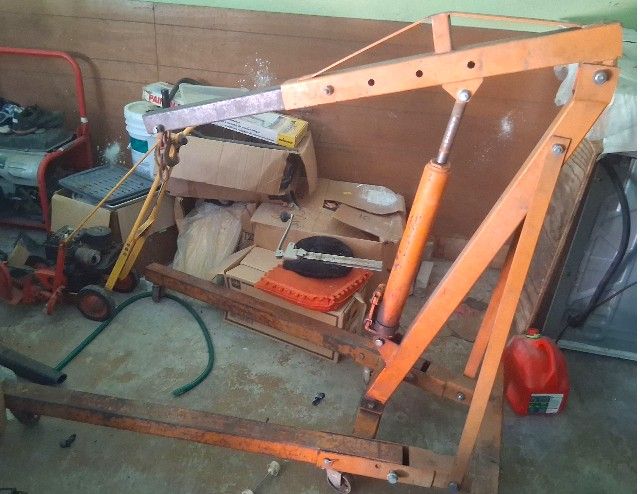 Orange Hydraulic Engine Hoists with Wear