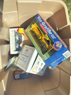 Several boxes of new and used train stuff