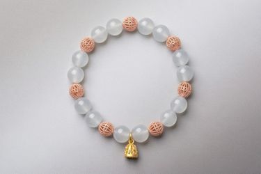 Genuine natural white jade beaded bracelet, crafted from smooth, polished gemstone beads. The pure milky white hue embodies clarity, peace, and timele