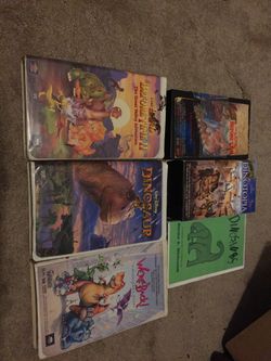 Various dinosaur vhs movies
