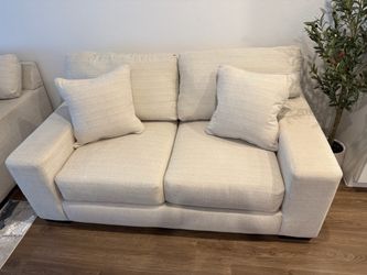 Cream Fabric Loveseat with Throw Pillows