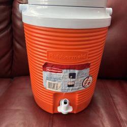 Orange Water Jug Cooler made by Rubbermaid