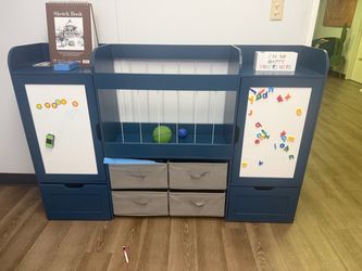 Blue cabinet with compartments