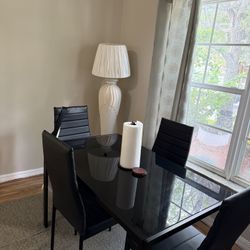 Black modern dining table with 4 chairs 