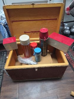 Old school picnic basket with 4thermos silverware  salt and pepper  shakers