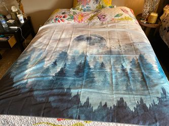 Tapestry blue green. Pine trees and moon. Delightful. Never been hung. Can steam for you