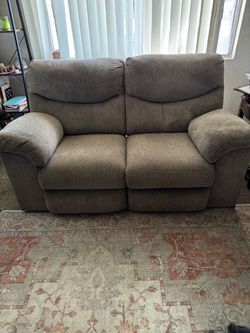 Ashley furniture Beige Fabric Reclining Loveseat