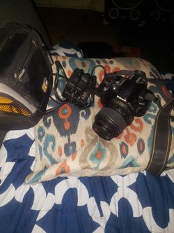 Nikon D3000 With Charger And Case And Sd
