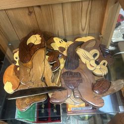 Handcrafted Disney intarsia wood carving featuring several characters, including Mickey Mouse, Lion King , Chip, and Dale