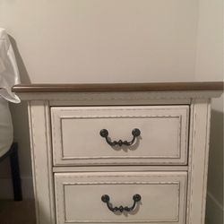 2 night stands a large dresser a couch