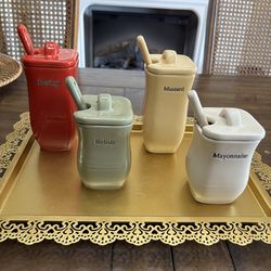 Four Longaberger stoneware condiments jar set with lids and spoons