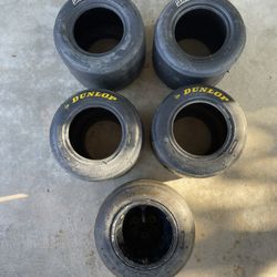 go kart tires 2 new  Bridgestone and one used with rim