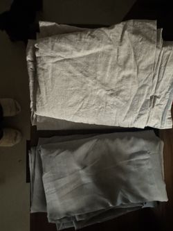 Two Sets Of Curtains 