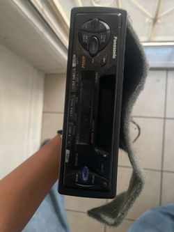 Panasonic CQ-R221U car cassette player receiver.