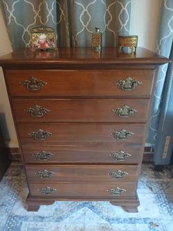 Beautiful solid wood cherry chest dresser by Young Hinkle