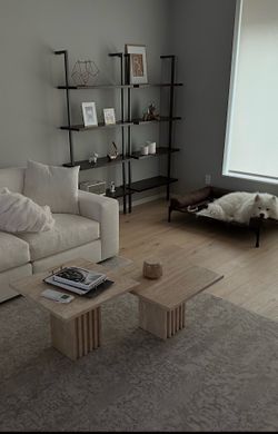 CB2 travertine cocktail tables