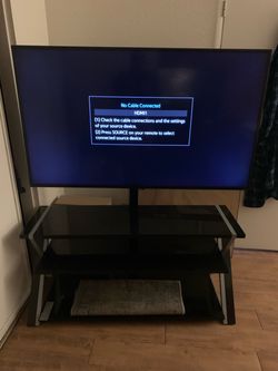Samsung 60 inch TV with stand included