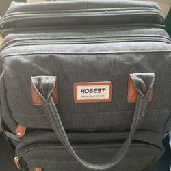 Honest Bag Filled With Baby Clothes 