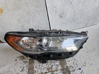 Ford fusion Right Headlight lid Oem