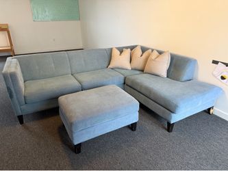 Blue L shape couch and ottoman