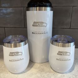 BRAND NEW - This is a set of Seattle Seahawks-themed stainless steel wine chiller and stemless wine glasses