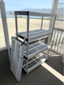 5- tier easy simply multi - purpose, plastic garage storage shelving unit $60