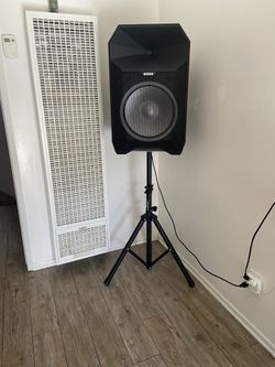 Portable speaker with stand