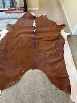 Pure cowhide floor length rug