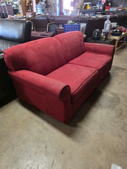 Old red sofabed, stains on the matress but the inner matress is very clean and in excellent condition,  JUST $20