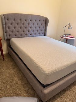 Tufted Queen size bed.