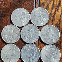 8 Silver Collectibles Coins, 4 Morgan's And 4 Pease Dollars 