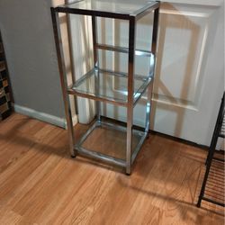 modern metal and glass display stand