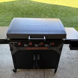 Blackstone Iron Forged 4 Burner Liquid Propane Outdoor Griddle with Hood